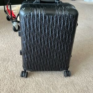 Dior carry on luggage used